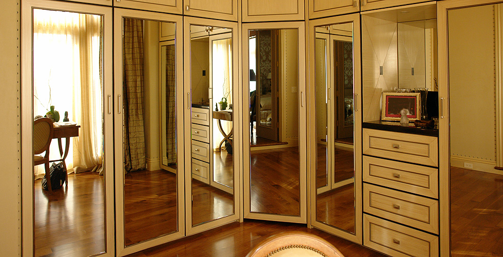 Custon built-in Wardrobe system with mirror doors